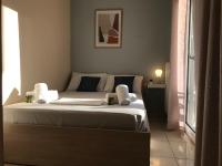 Posteľ alebo postele v izbe v ubytovaní Irini Apartments