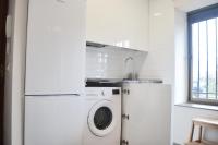 Kuchyň nebo kuchyňský kout v ubytování Apartamento El Monasterio