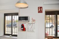 TV a/nebo společenská místnost v ubytování Apartamento El Monasterio
