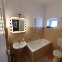 Łazienka w obiekcie Corte Apartman