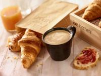 a table topped with a cup of coffee and pastries at ibis Paris Bastille Faubourg St Antoine in Paris