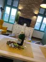 TV a/nebo společenská místnost v ubytování Pedal Apartman Szeged City