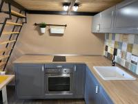 Kuchyň nebo kuchyňský kout v ubytování Pedal Apartman Szeged City