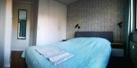 Łóżko lub łóżka w pokoju w obiekcie Zielona Krynica Apartament