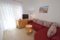 Telewizja i/lub zestaw kina domowego w obiekcie Apartments Buturajac