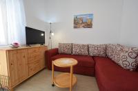 Telewizja i/lub zestaw kina domowego w obiekcie Apartments Buturajac