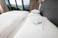 A bed or beds in a room at Linde Villas