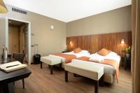 Łóżko lub łóżka w pokoju w obiekcie Hotel Viest