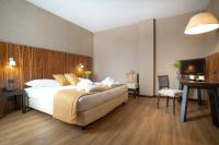 Łóżko lub łóżka w pokoju w obiekcie Hotel Viest
