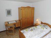 Postel nebo postele na pokoji v ubytování La Casa Ferienwohnung Seeigel