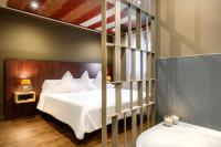 Postel nebo postele na pokoji v ubytování Hotel La Casueña