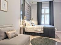 Łóżko lub łóżka w pokoju w obiekcie MINT Boutique Studio Apartments