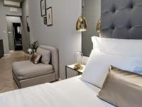 Łóżko lub łóżka w pokoju w obiekcie MINT Boutique Studio Apartments