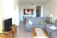 A television and/or entertainment centre at Apartamento Jardines