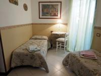 Posteľ alebo postele v izbe v ubytovaní Casa Margherita Affittacamere B&B