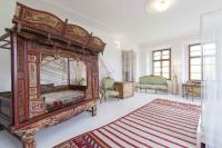 Postel nebo postele na pokoji v ubytování Chateau Třebešice
