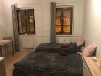 Postel nebo postele na pokoji v ubytování Old Town Apartments S12