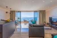 Posezení v ubytování BEACH FRONT VILLA FRAN - DELUXE SEA VIEW SUITE with private jacuzzi # 3