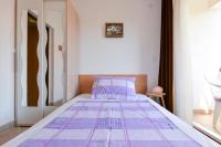 Łóżko lub łóżka w pokoju w obiekcie Rooms & Apartments Hegic