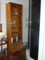 a bathroom with a shower and a wooden book shelf at AS13247 - P2 Cabine climatisé avec belle vue sur la Mer in Le Grau-du-Roi