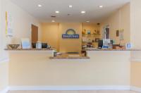 a view of the front counter of a days inn pharmacy at Days Inn by Wyndham Shenandoah in The Woodlands