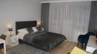 Posteľ alebo postele v izbe v ubytovaní Apartament Agata