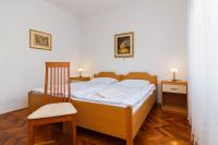 Posteľ alebo postele v izbe v ubytovaní Apartment Lory with a sea view near the beach