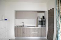 A kitchen or kitchenette at IseoLakeRental - La Villina - Zù