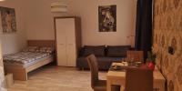 Posteľ alebo postele v izbe v ubytovaní Apartament Kosciuszki