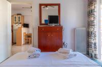 Postel nebo postele na pokoji v ubytování Comfy beach flat, 10min to the city center