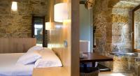Postel nebo postele na pokoji v ubytování Hotel Torre De Villademoros
