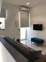 A television and/or entertainment centre at Frida Kahlo appartament
