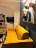 A television and/or entertainment centre at Frida Kahlo appartament