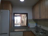 Kuchyň nebo kuchyňský kout v ubytování Apartamento primera linea Isla Canela