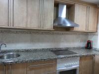 Kuchyň nebo kuchyňský kout v ubytování Apartamento primera linea Isla Canela