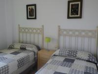 Postel nebo postele na pokoji v ubytování Apartamento primera linea Isla Canela