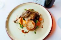 a plate of food with a piece of meat and vegetables at The Maltsters Arms in Totnes