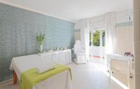 A bed or beds in a room at Hotel San Giorgio Terme