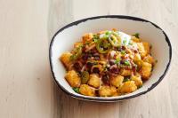 a bowl of food with some food in it at Holiday Inn & Suites Cedar Falls-Waterloo Event Ctr by IHG in Cedar Falls