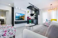 TV a/nebo společenská místnost v ubytování Twin Apart Hotel