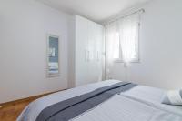 Posteľ alebo postele v izbe v ubytovaní Apartment Mirela