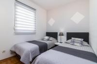 Posteľ alebo postele v izbe v ubytovaní Apartment Mirela