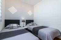 Posteľ alebo postele v izbe v ubytovaní Apartment Mirela