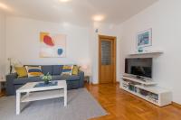 Televízia a/alebo spoločenská miestnosť v ubytovaní Apartment Mirela