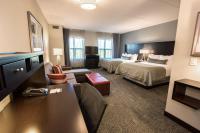 Staybridge Suites Albany Wolf Rd-Colonie Center by IHGにあるベッド