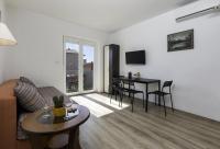 TV a/nebo společenská místnost v ubytování Apartments Jakoplić
