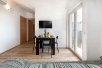 TV a/nebo společenská místnost v ubytování Apartments Jakoplić