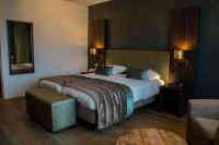 Landgoed Hotel Tatenhove Texelにあるベッド