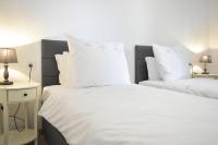 Postel nebo postele na pokoji v ubytování Rooms Monika