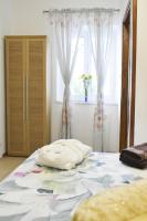 Postel nebo postele na pokoji v ubytování Rooms Monika